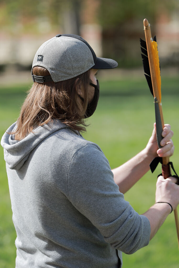 MU sophomore Blake Blechle prepares to throw an atlatl